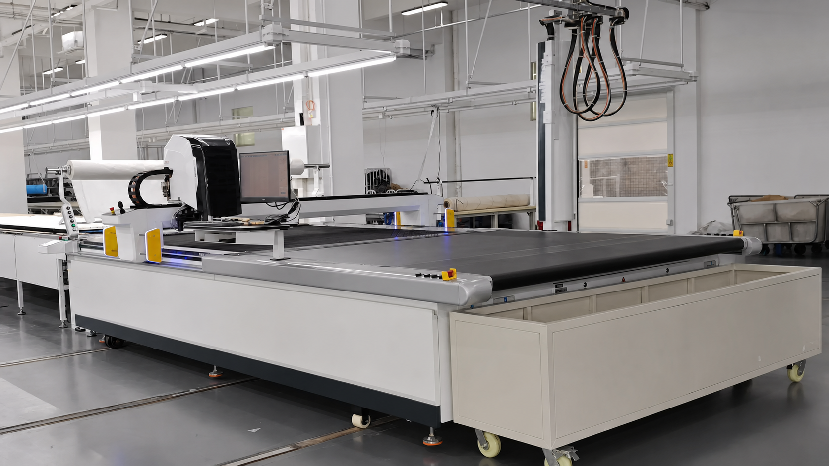 Digital textile cutting table in an affiliated support facility